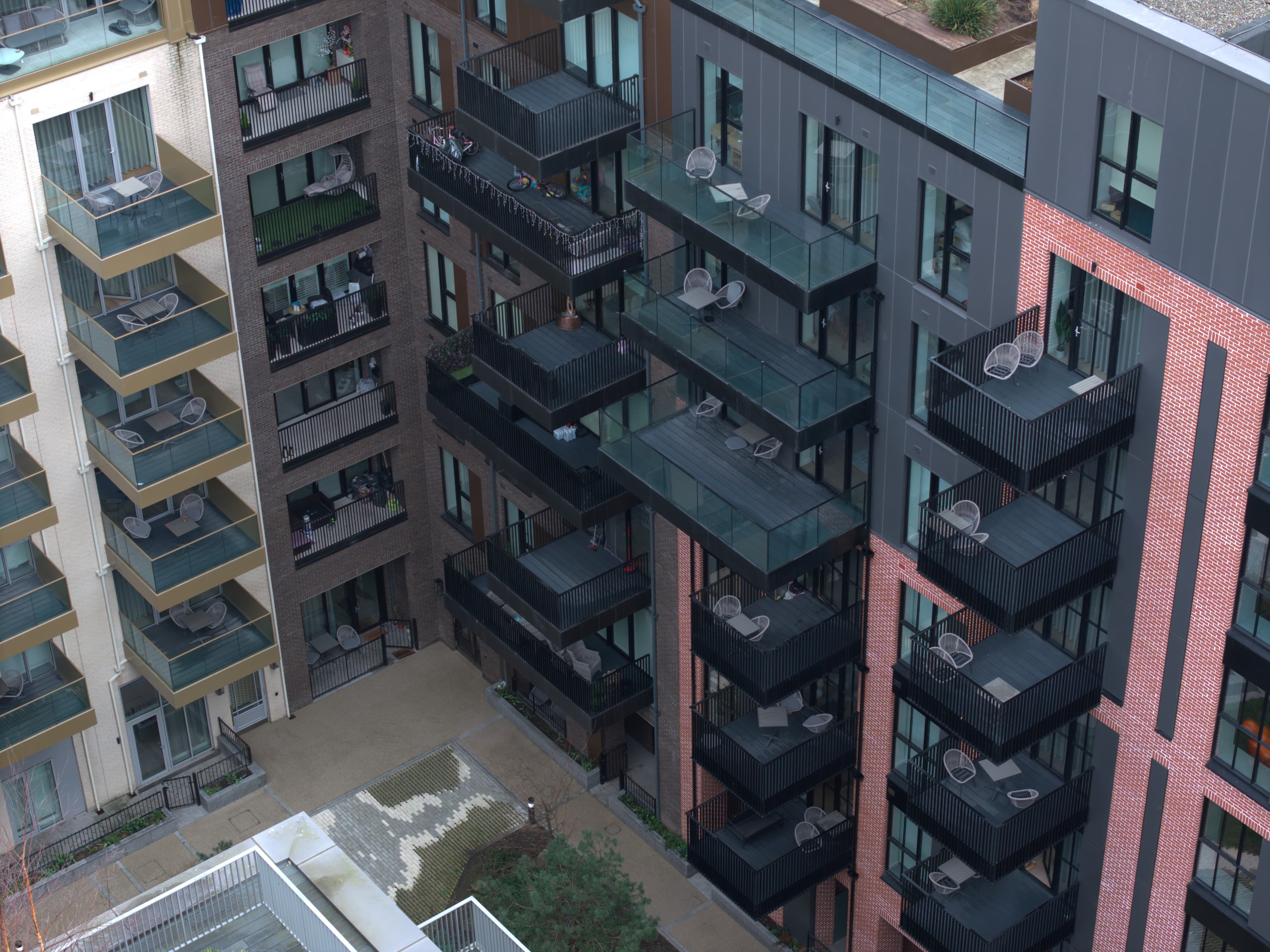 Aerial view of staggered Forte Pespa aluminium balconies across a Dublin residential courtyard